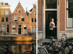 Makelaar met klembord bij de voordeur van een historisch Amsterdams grachtenpand met sierlijke trapgevel en origineel baksteendetail.